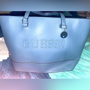 For sale Guess brand New purse , in excellent condition